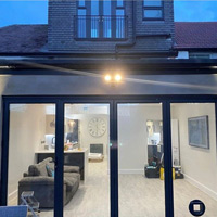 Bi-folding door